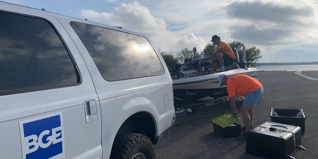 BGE team members preparing a boat to go out into Lake Lavon
