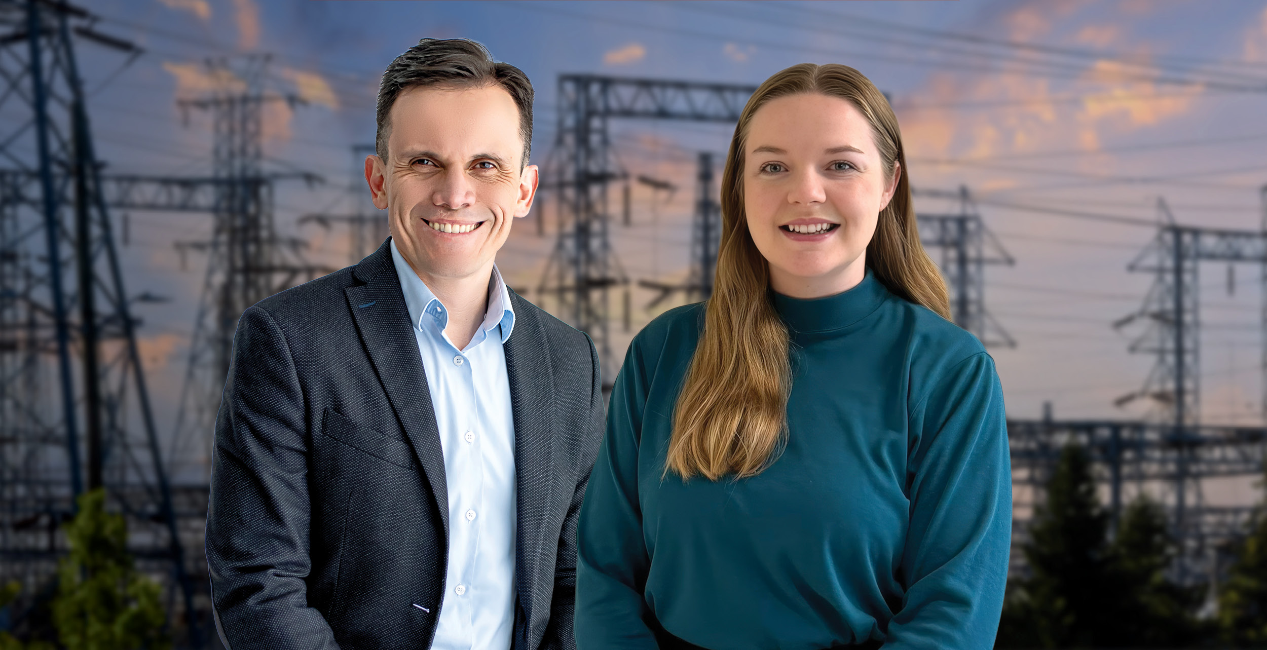 Fabian and Rebecca, a man in a suit and a woman in a teal sweater, are smiling in front of an outdoor backdrop featuring electrical power lines and towers at sunset.